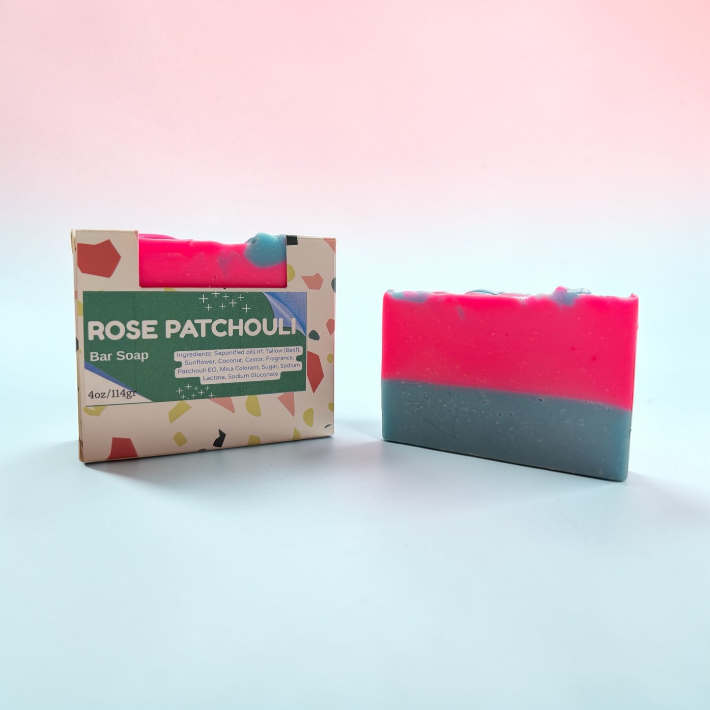 Rose Patchouli bar soap with packaging on a light background
