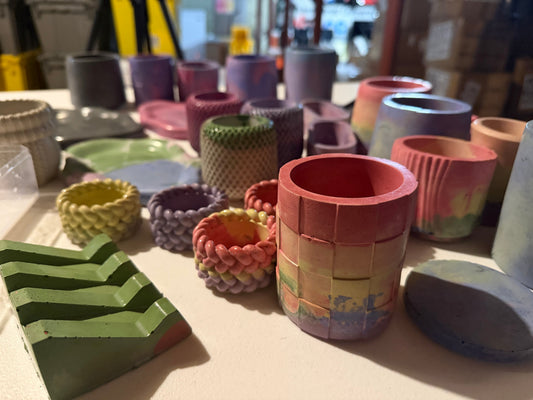 colorful concrete soap dish and candle vessels
