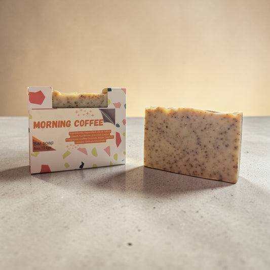 Bar of soap with 'Morning Coffee' packaging on a neutral background