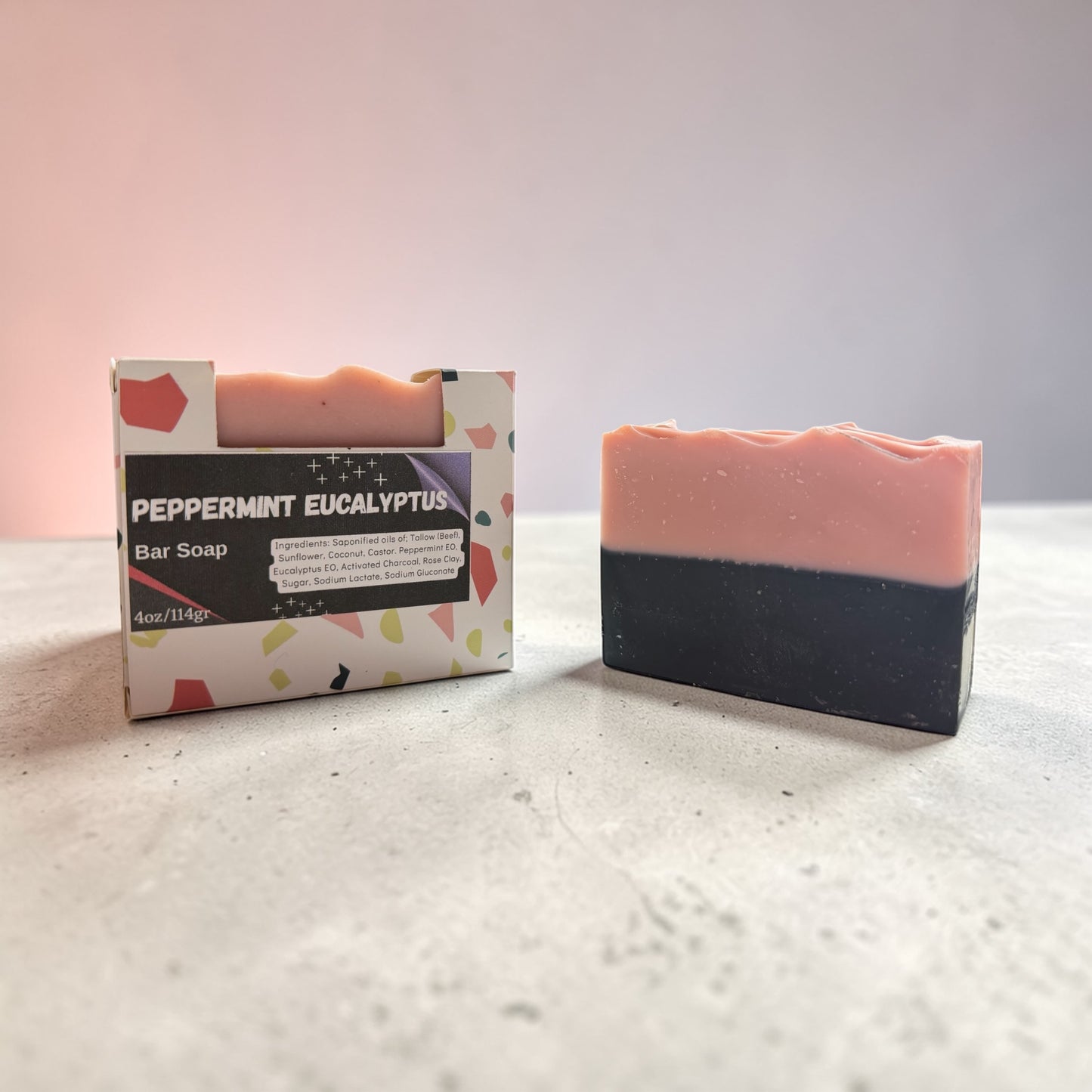 Peppermint Eucalyptus bar soap with packaging on a light surface