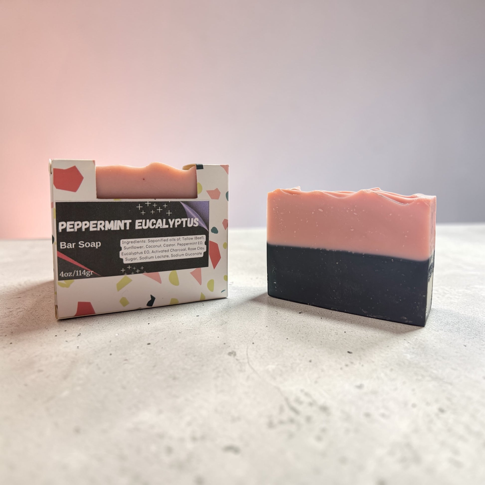 Peppermint Eucalyptus bar soap with packaging on a light surface